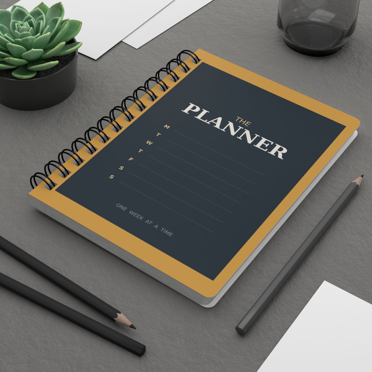 The Weekly Planner Spiral Notebook